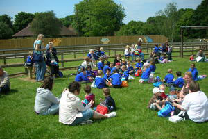 School group meeting in the meadow